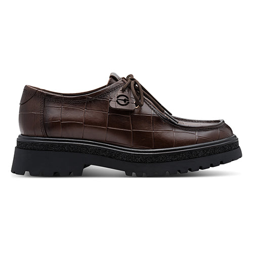 Brown leather shoe with a textured pattern on a white background