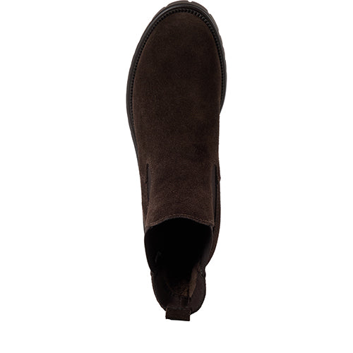 Brown suede ankle boot on a white background