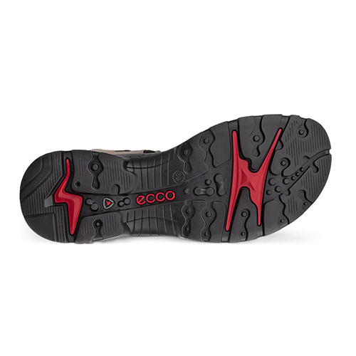 Black and red sole of a shoe with &