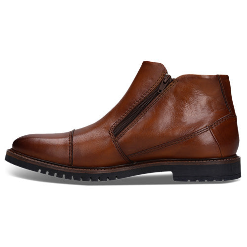 Brown Bugatti ankle boot with black zip , set against a white background