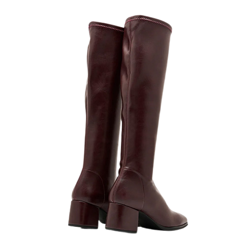 pair of burgundy knee high boots on a white background