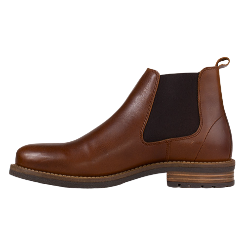 A brown leather Chelsea boot with a dark brown elastic side panel and a low stacked heel, shown in a side profile on a white background.