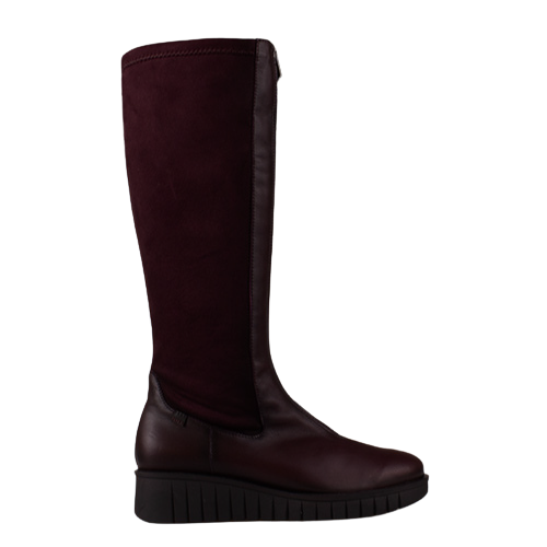 A single knee-high boot in deep burgundy, featuring a suede-like upper shaft and smooth leather around the ankle and toe, set against a plain white background.
