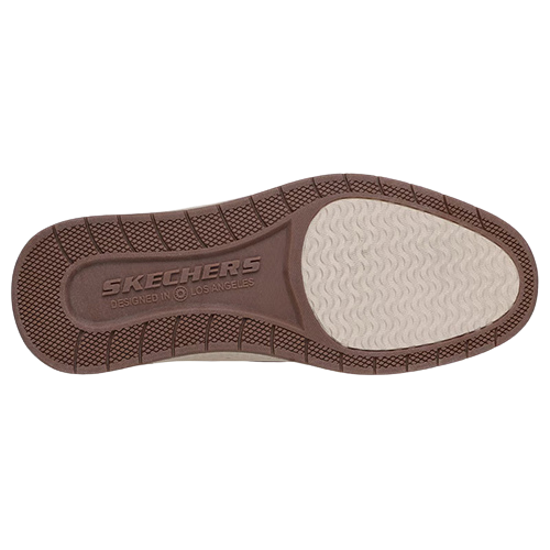 sole of shoe on a plain background