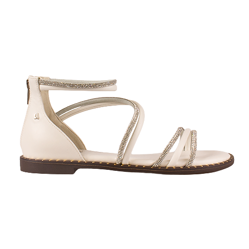 White sandal with thin straps and rhinestone embellishments on a white background