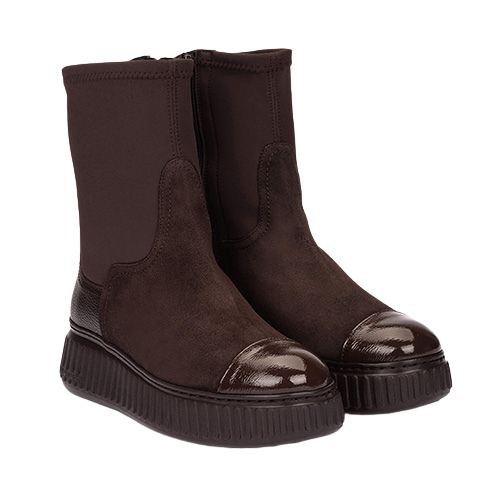 Pair of brown mixed fabric boot on a white background