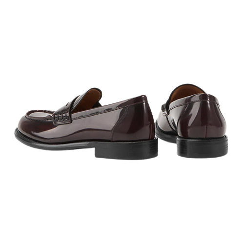 Pair of burgundy loafers on a white background