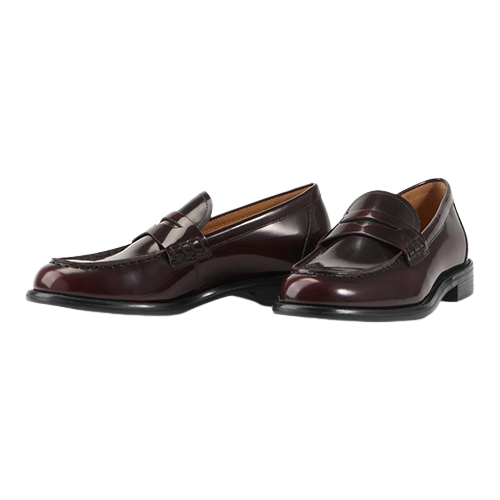Pair of burgundy loafers on a white background