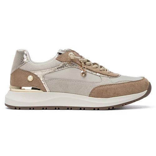 A low-top trainer in beige, taupe, and light gray suede with metallic gold glitter panels and gold-tone hardware, shown in a side profile on a white background.