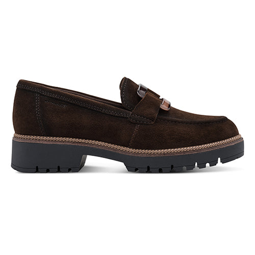Brown suede loafer with black sole on a white background 