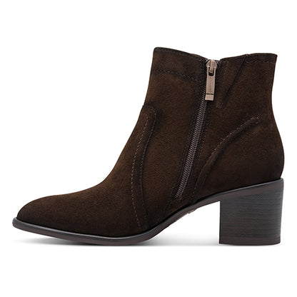 Brown suede ankle boot with a zipper on a white background