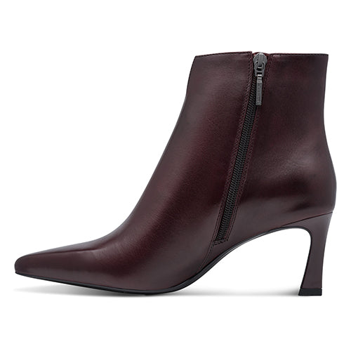 Burgundy ankle boot with a zipper on a white background