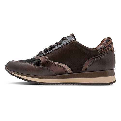Brown sneaker with leopard print accents on a white background