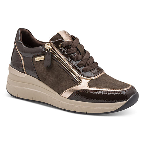 Brown sneaker with beige accents on a white background