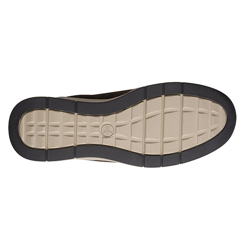 Close-up of a shoe sole with a brand logo on a white background