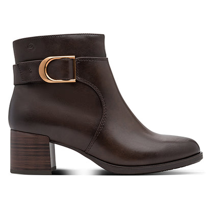Brown ankle boot with gold buckle on a white background