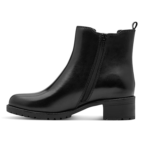Black boot with zip on a white background