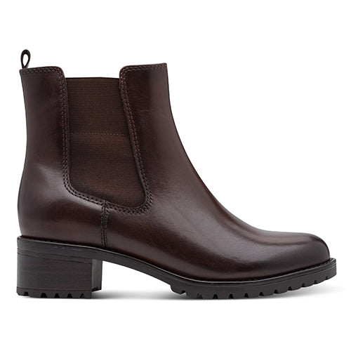 Brown leather ankle boot on a white background