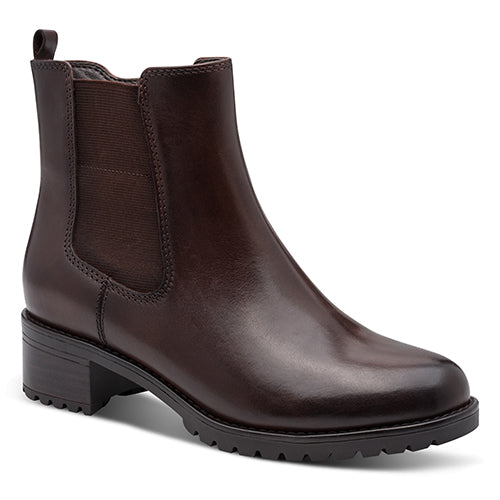 Brown leather Chelsea boot on a white background