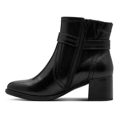 Black ankle boot with a block heel on a white background