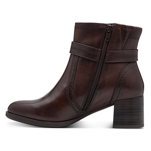 Brown leather ankle boot with a zip on a white background