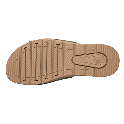 Tan sole of a shoe on a white background