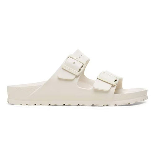 Cream sandal with two buckles on a white background