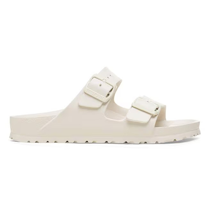 Cream sandal with two buckles on a white background