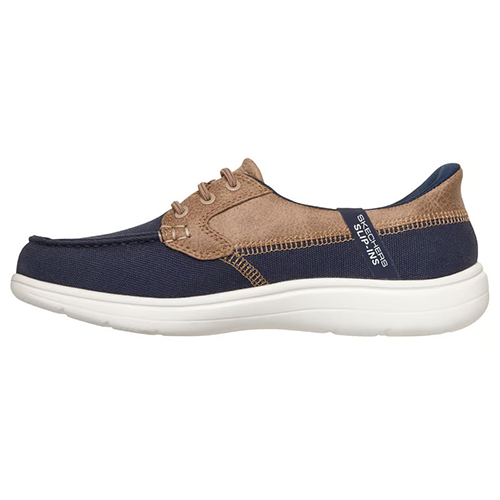 Navy and brown boat shoe with white sole on a white background