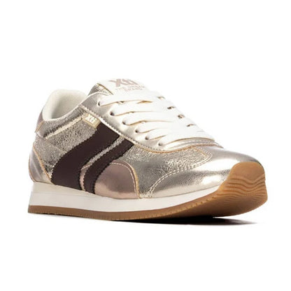 A metallic silver and brown low-top sneaker with white laces and a brown gum sole, shown from a three-quarters angle on a white background.