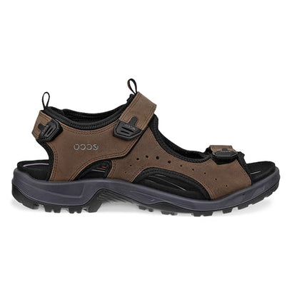 Brown sandal with black sole on a white background
