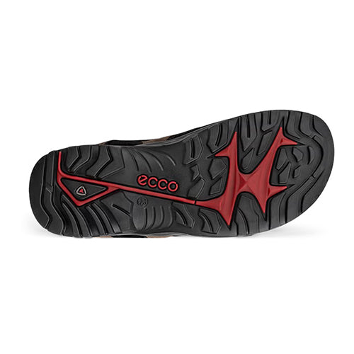 Black and red sole of a shoe with &