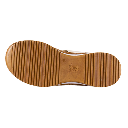 Brown shoe sole with tread pattern on a white background