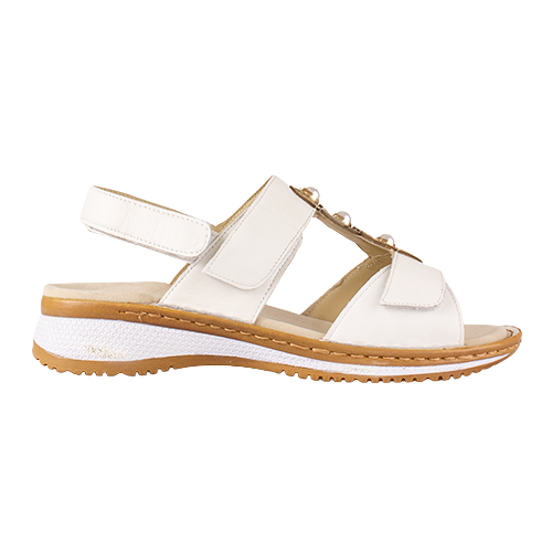 White sandal with brown sole on a white background