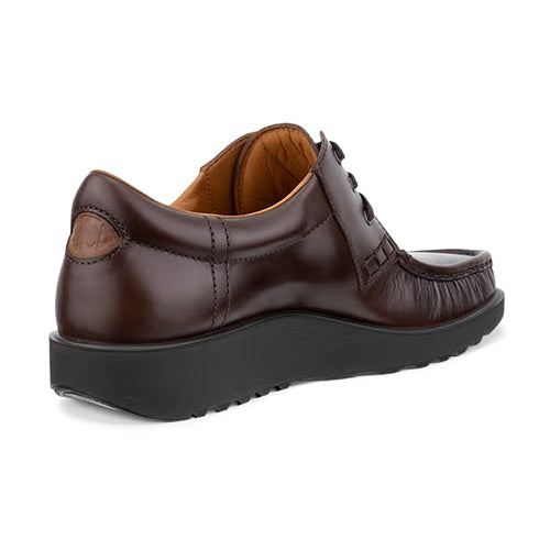 A dark brown leather lace-up shoe with a thick black platform sole, shown from a three-quarters rear angle on a white background.