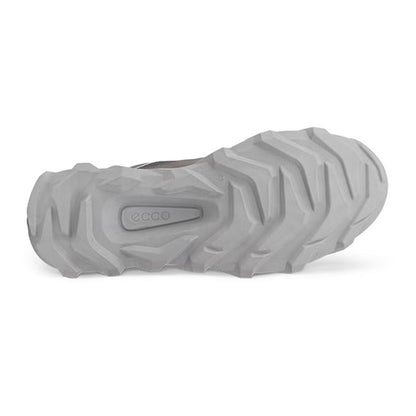 A close-up of a grey rugged shoe sole with deep lugs and a visible embossed ECCO logo, shown on a plain white background.