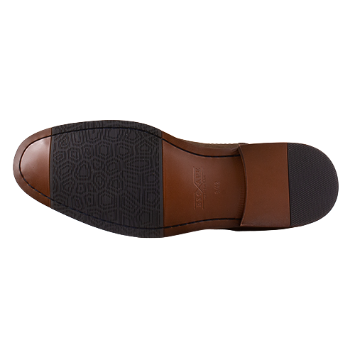 Brown shoe sole with black tread pattern on a white background
