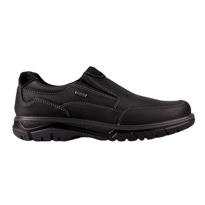 Black suede slip on shoe on white background