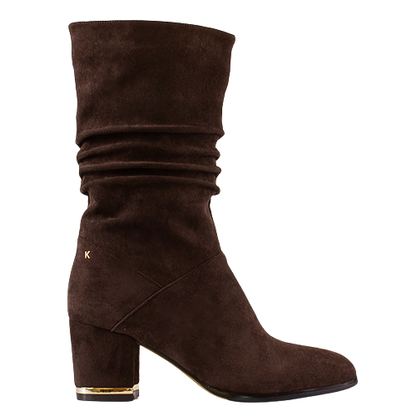 A dark brown suede slouchy mid boot with a block heel and a small gold &
