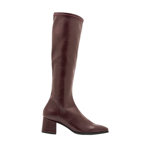 Burgundy knee high boot on a white background
