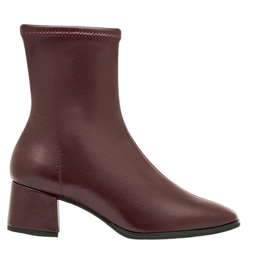 Single burgundy ankle boot on a white background