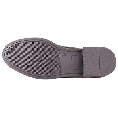 The outsole of a gray shoe, showing a textured tread pattern on the front and a solid heel block, photographed against a plain white background.