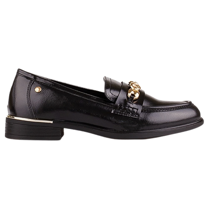 A black leather penny loafer with a gold-tone decorative hardware detail on the strap, a low block heel, and a gold accent on the side, shown in profile against a white background.