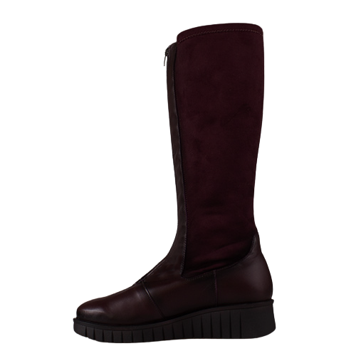 A single knee-high boot in deep burgundy, featuring a smooth leather lower section and a suede-like upper section, shown from a side profile on a white background.