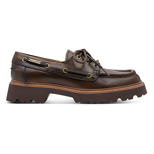 Brown leather boat shoe on a white background