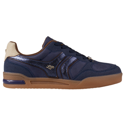 A low-top trainer in navy blue suede and metallic navy panels, with a tan heel tab, brown trim, and a gum brown sole, shown from the side on a white background.