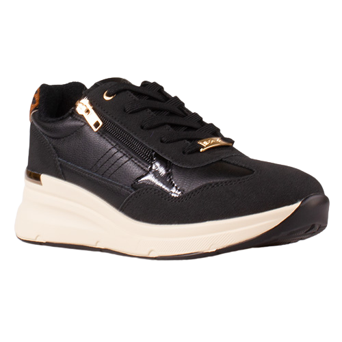 A black low-top sneaker with a thick cream-colored sole, black laces, a side zipper with gold-tone hardware, and gold logo detailing on the side and tongue.