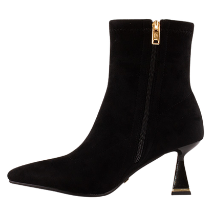 A black suede ankle boot with a pointed toe, a high stiletto heel, and a gold-tone zipper on the side, shown against a plain white background.