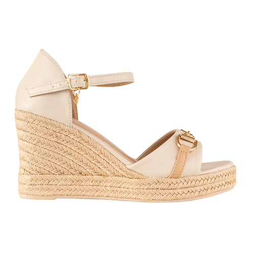 Beige wedge sandal with espadrille sole on a white background