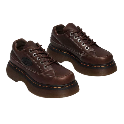 Pair of brown leather shoes on a white background